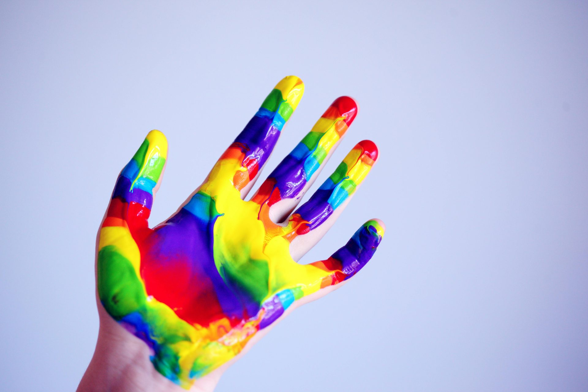 Person's Hand With Paints